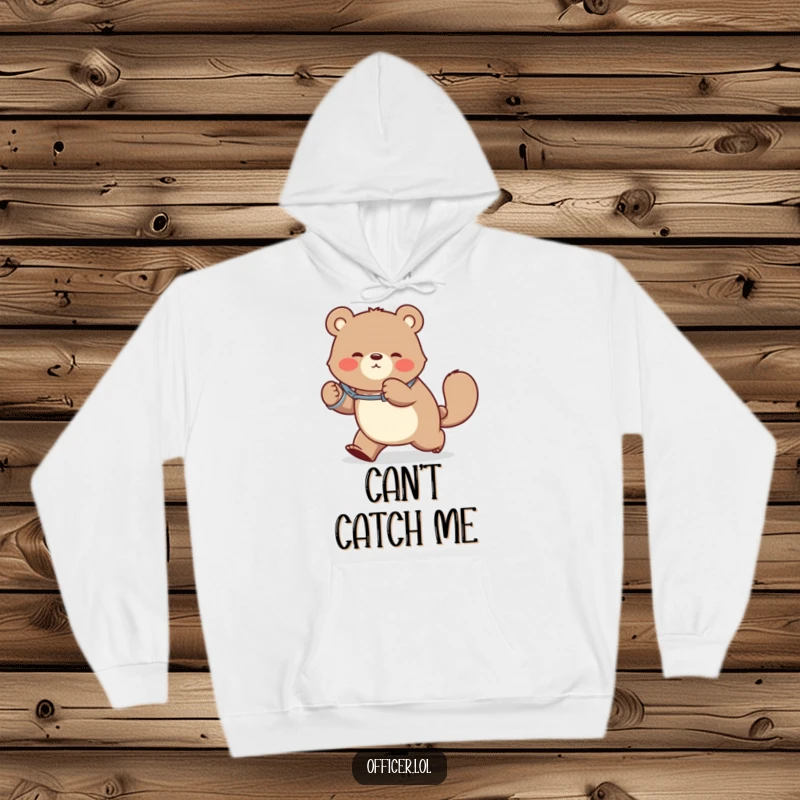 Funny hoodie with a bear in handcuffs chasing its tail, a whimsical and humorous depiction of playful mischief and boundless energy.